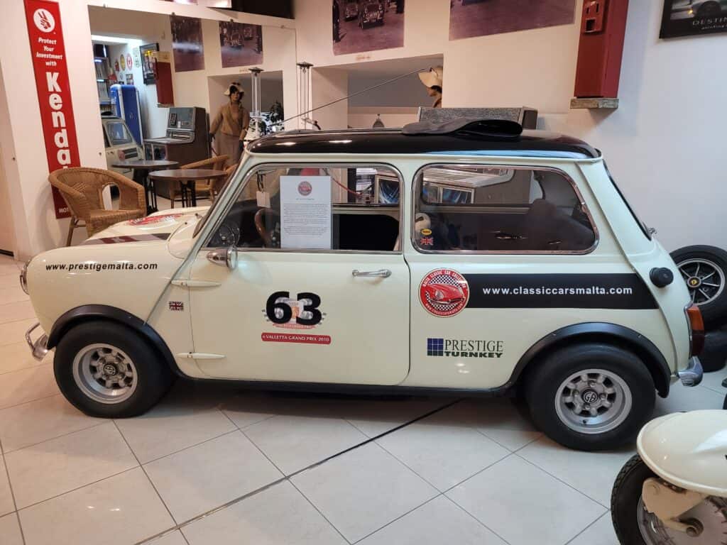 side view of a cream-colored Mini Cooper